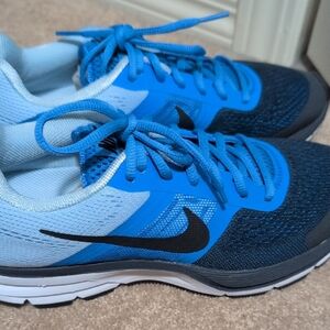 Nike Pegasus Women's Black and Blue Athletic Shoes